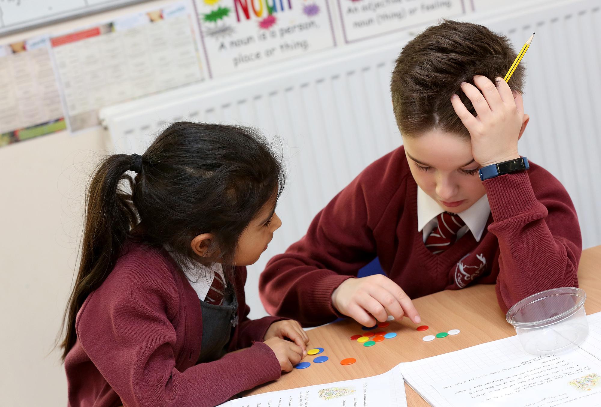 Year 4 children working on a collaborative art project